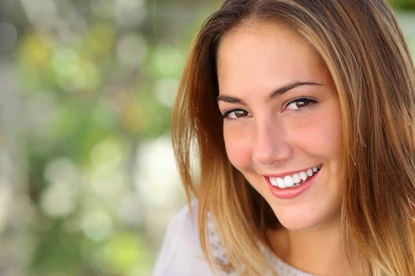 Women smiling from a dental appointment